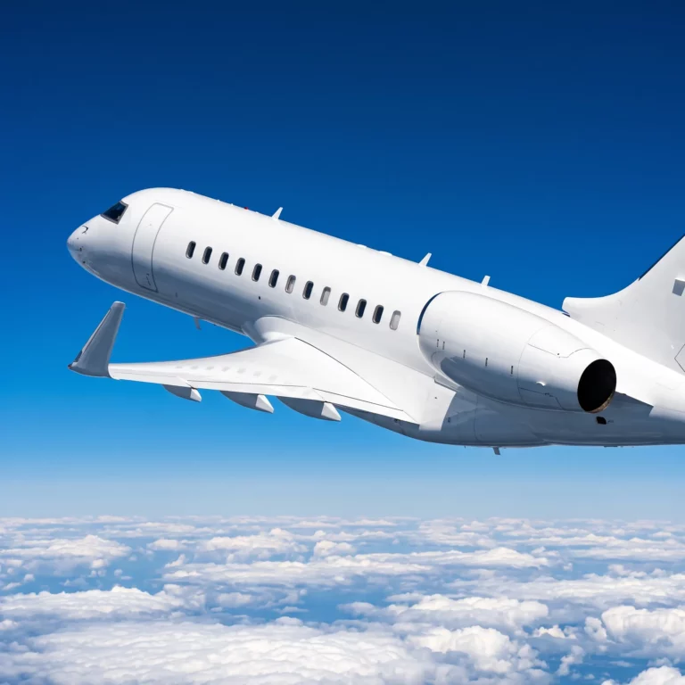 Bombardier Global 6500 long-range private jet flying above clouds over the Atlantic